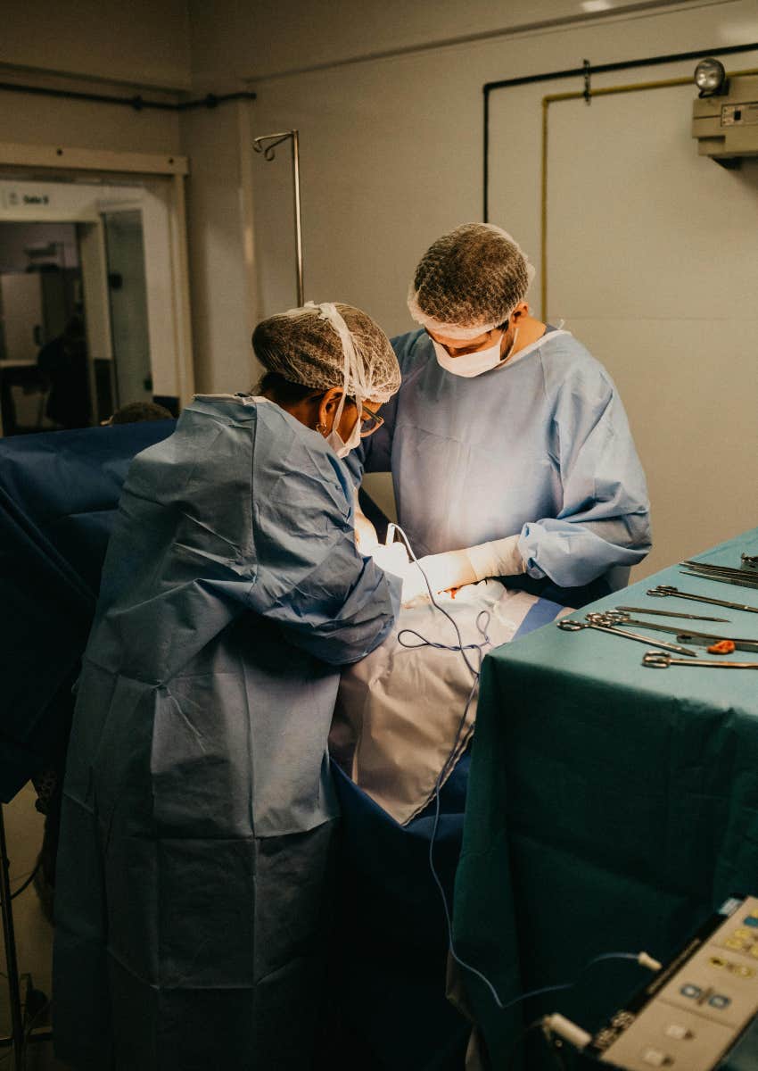 two surgeons working together during a surgery