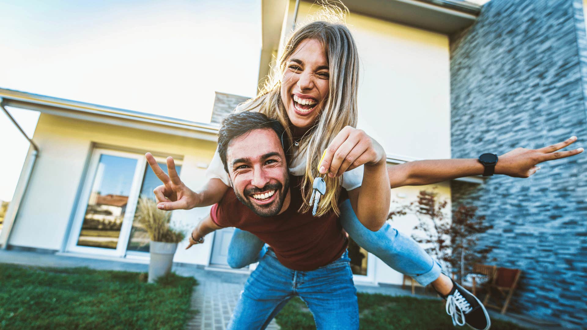 happy couple who just bought a home