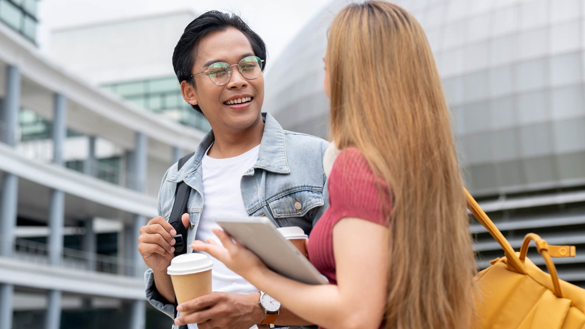 Gen Z friends talking and walking outside together