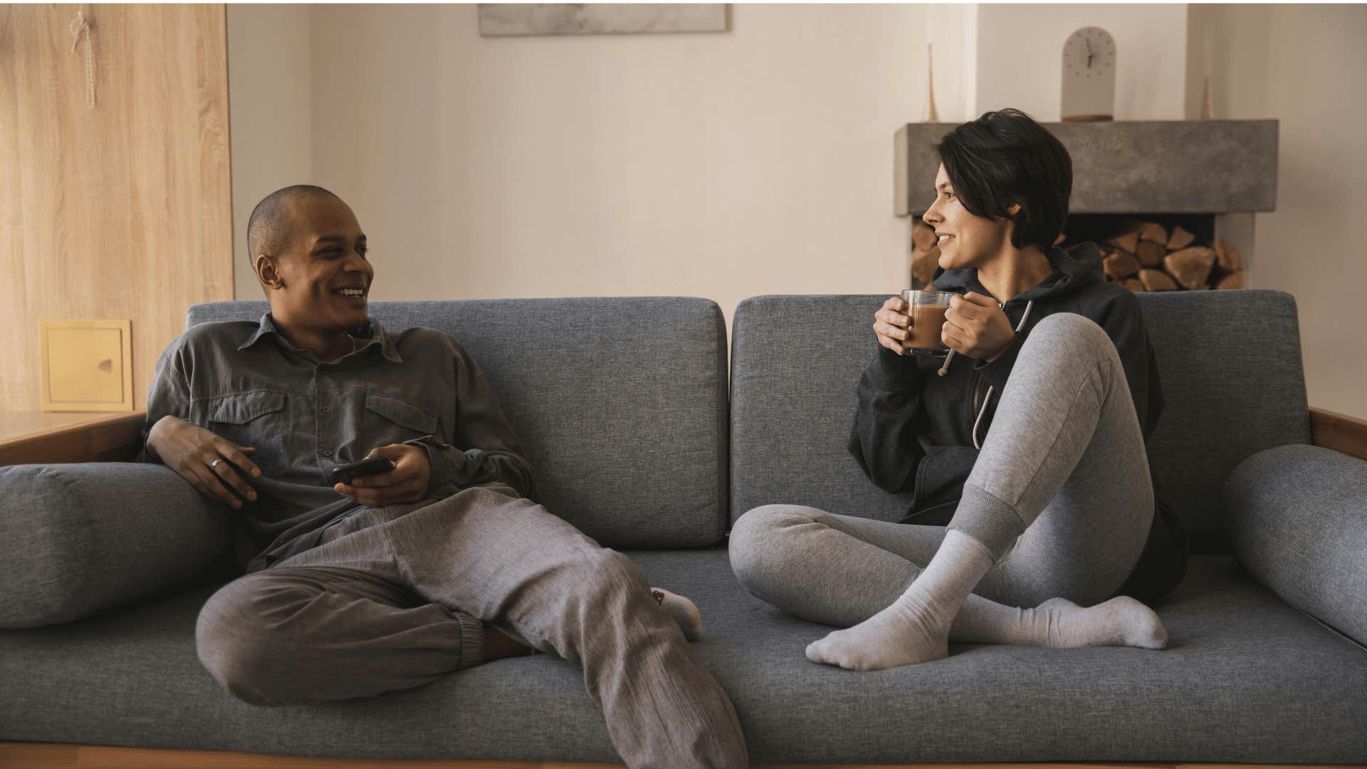 couple sitting next to each other on couch