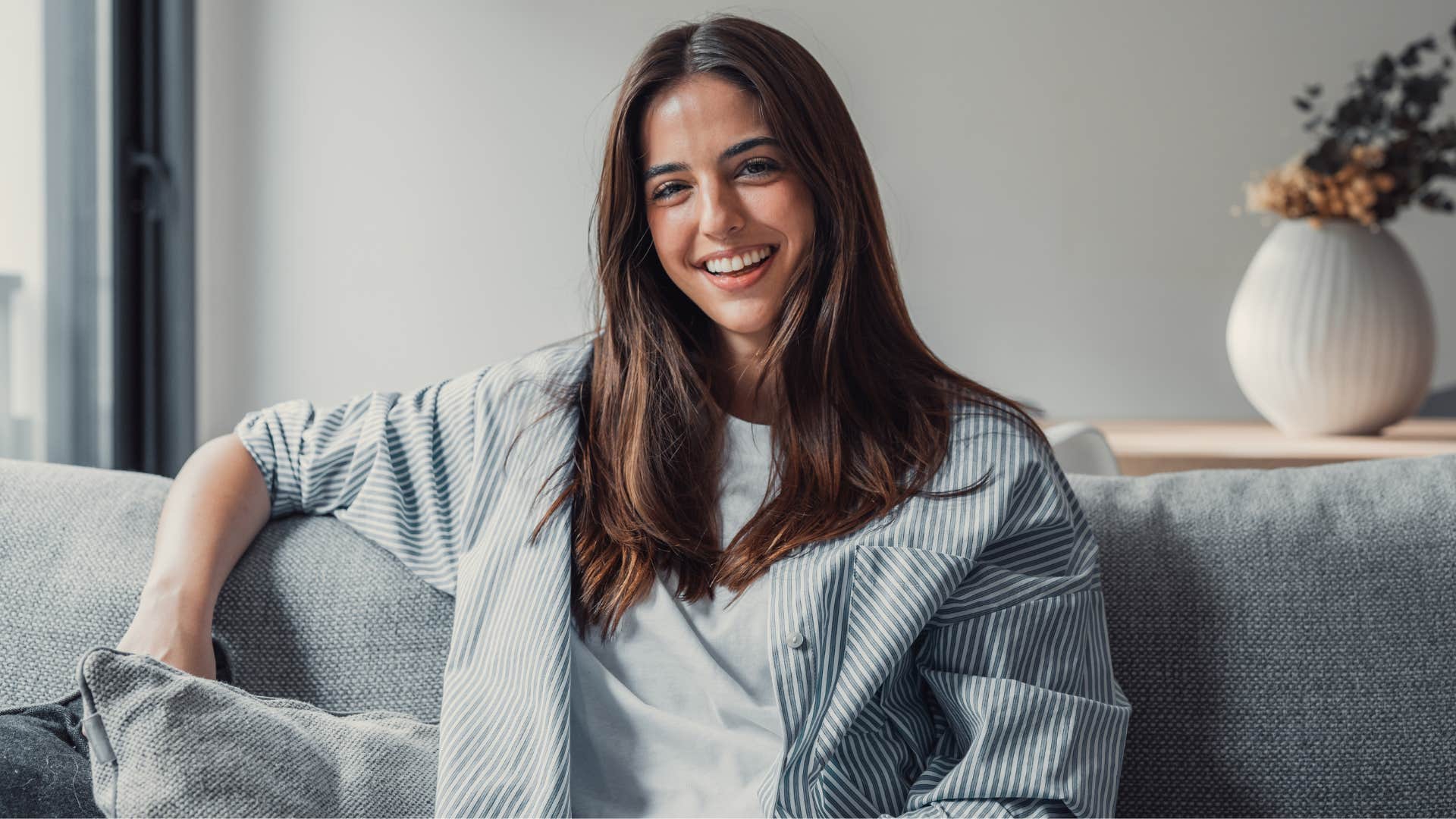 Woman relaxing on her couch