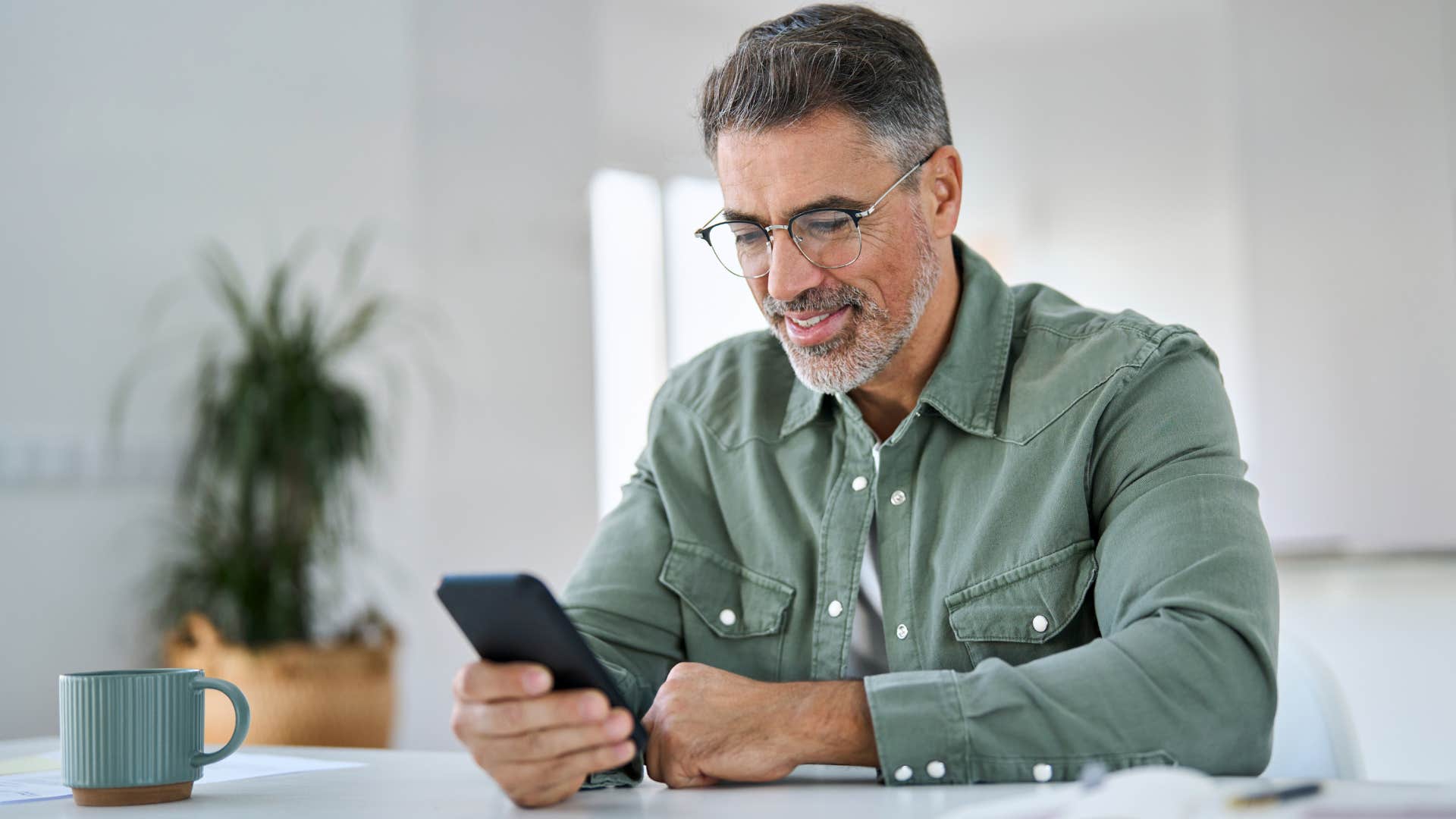 Man texting on his phone