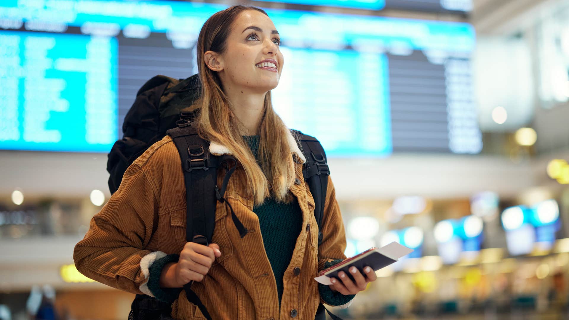 Woman smiling in the airport.