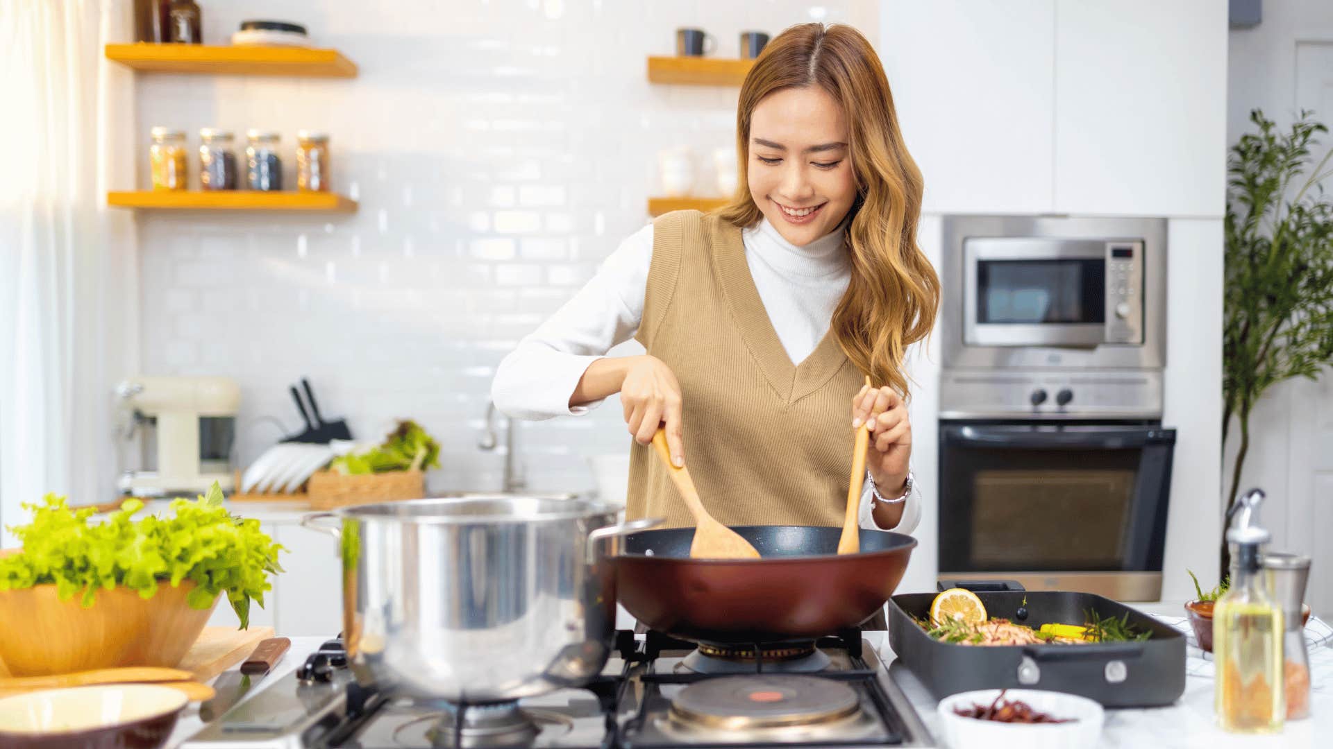 woman cooking in kitchen 