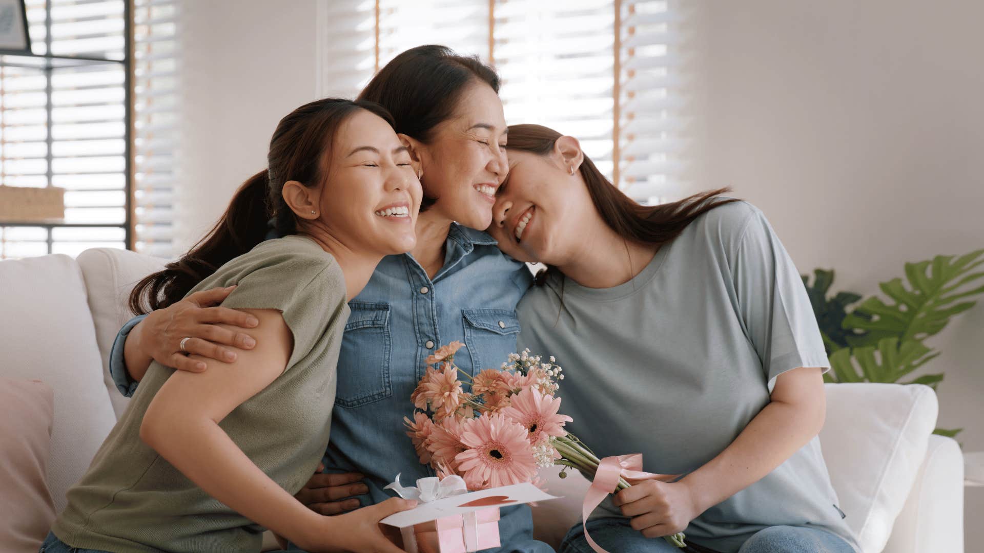 mom and daughters celebrating