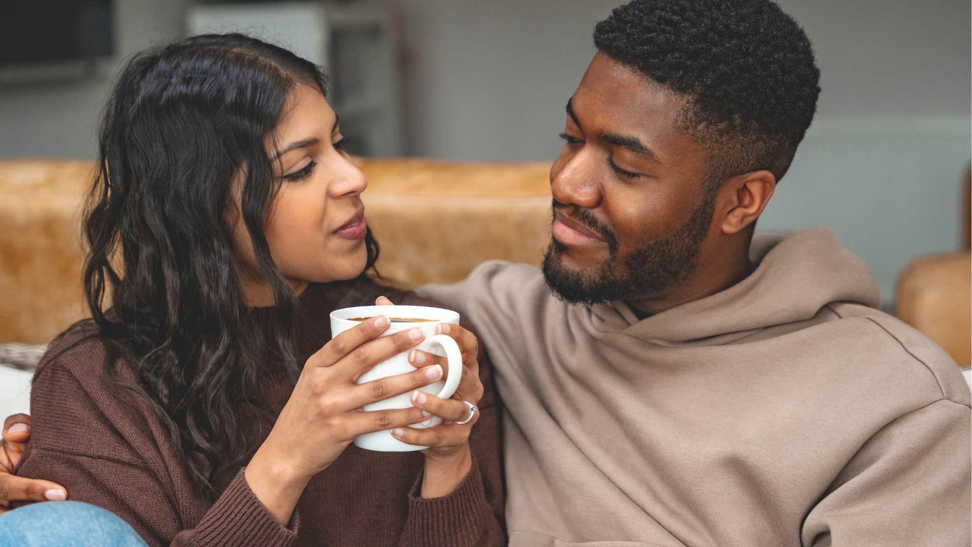 Couple smiling and making eye contact with each other