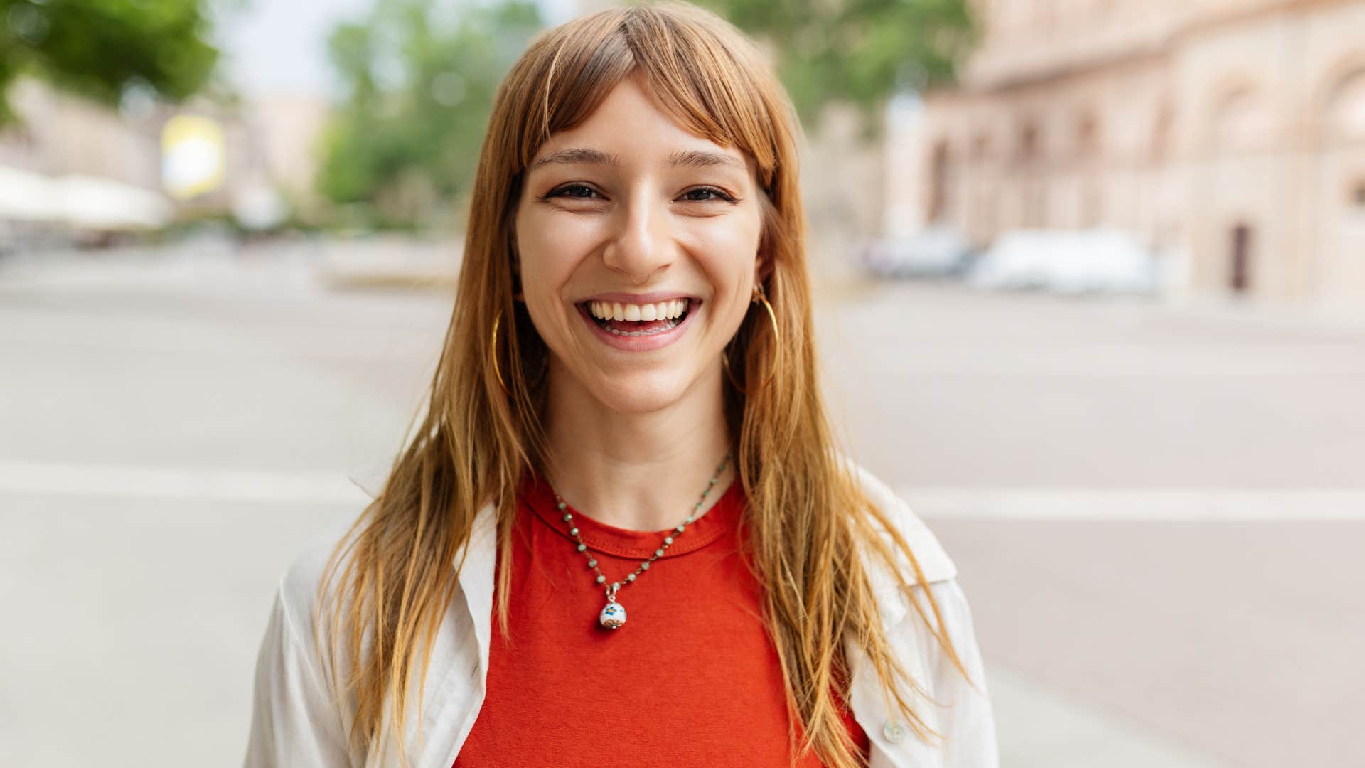 Woman smiling directly at the camera