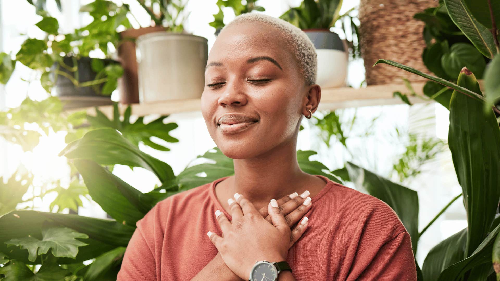 woman meditating and smiling 