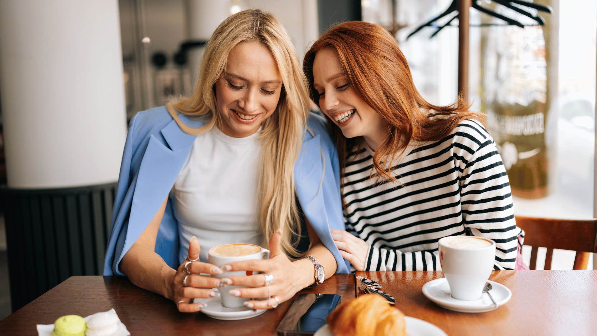 two friends chatting over coffee