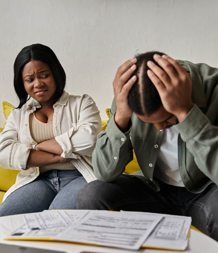 defensive woman looks at upset unapologetic man