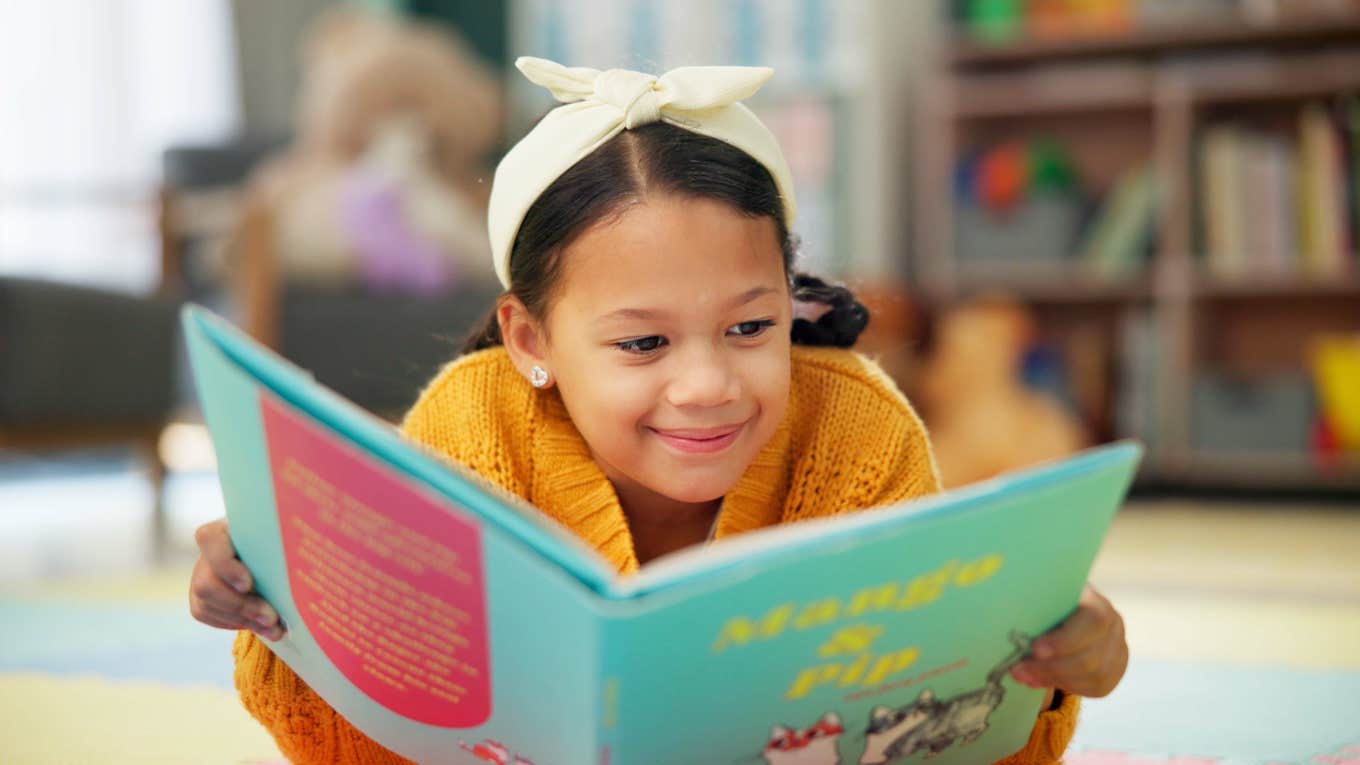 highly intelligent little girl reading