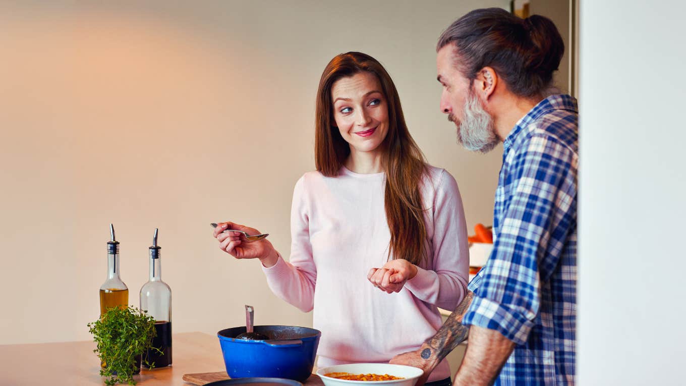  Wife making her husband his favorite food after work, emotionally seducing him.