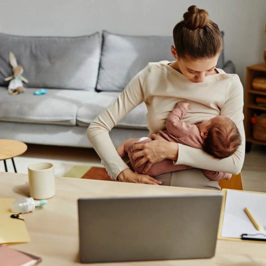 Woman breastfeeding while working