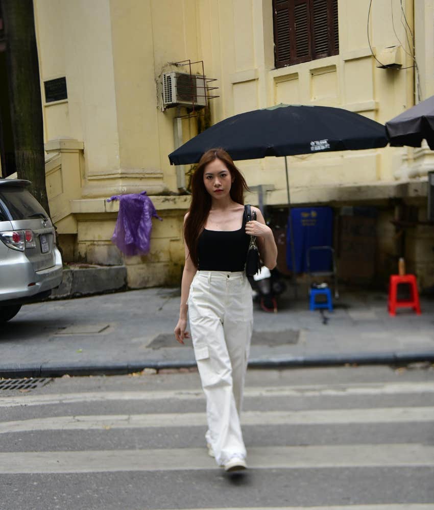 woman crossing city street