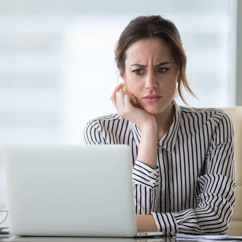 Woman reading a job application that requires a video