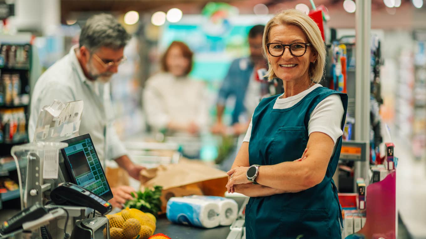 Elderly woman working at the grocery store