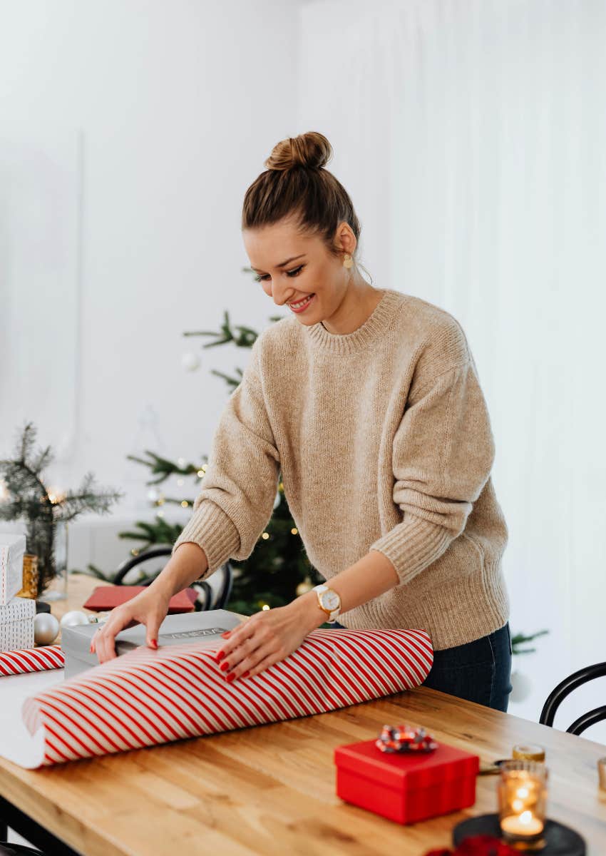 woman wrapping Christmas presents