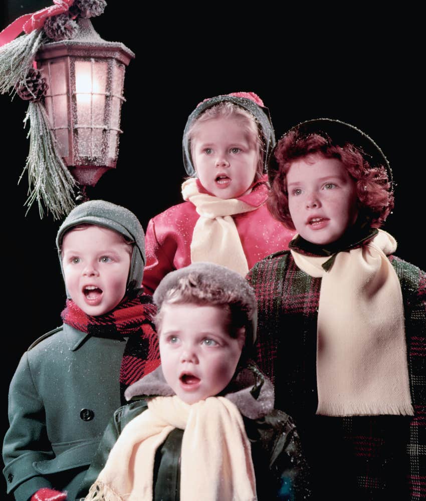 image of old-timey kids singing Christmas carols