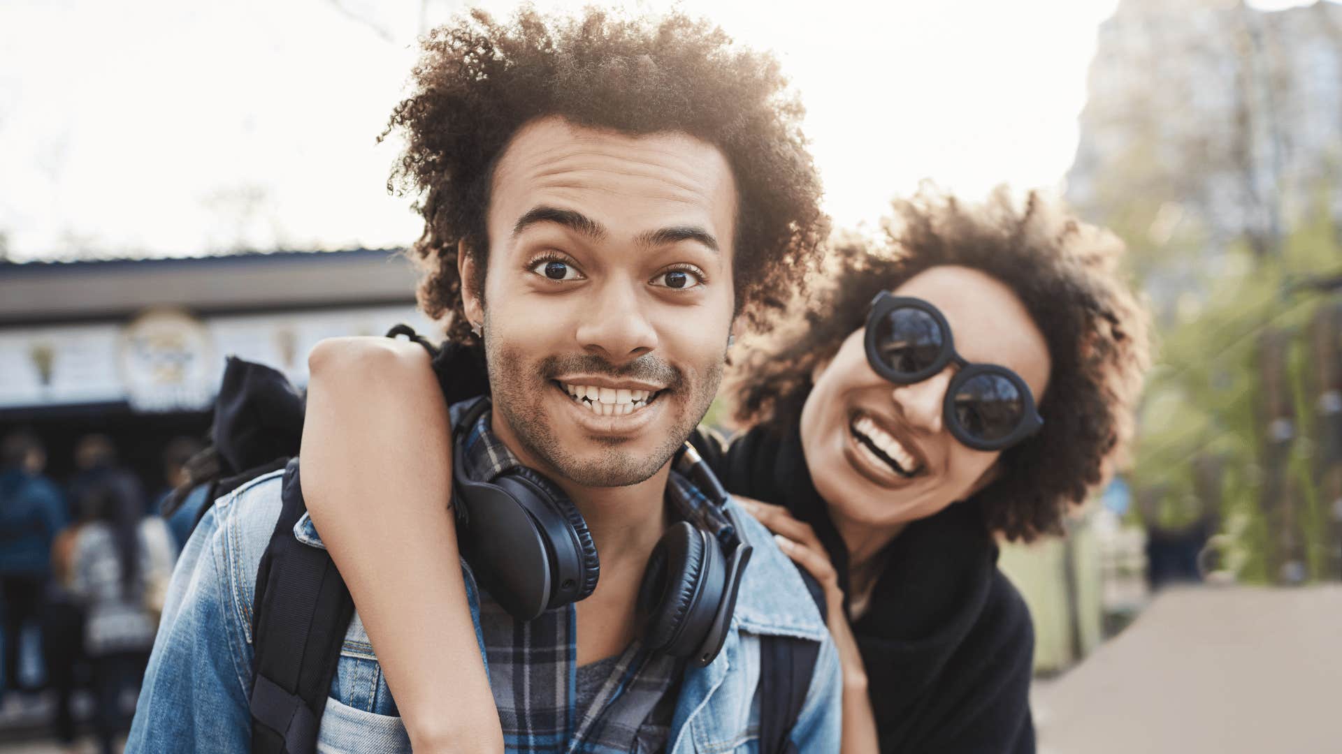 Elated man gets hugged by woman who said he is handsome