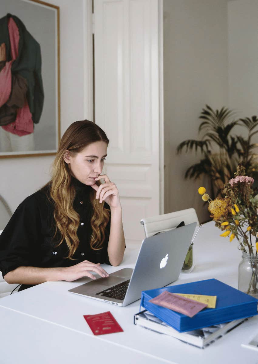 young woman working on a laptop