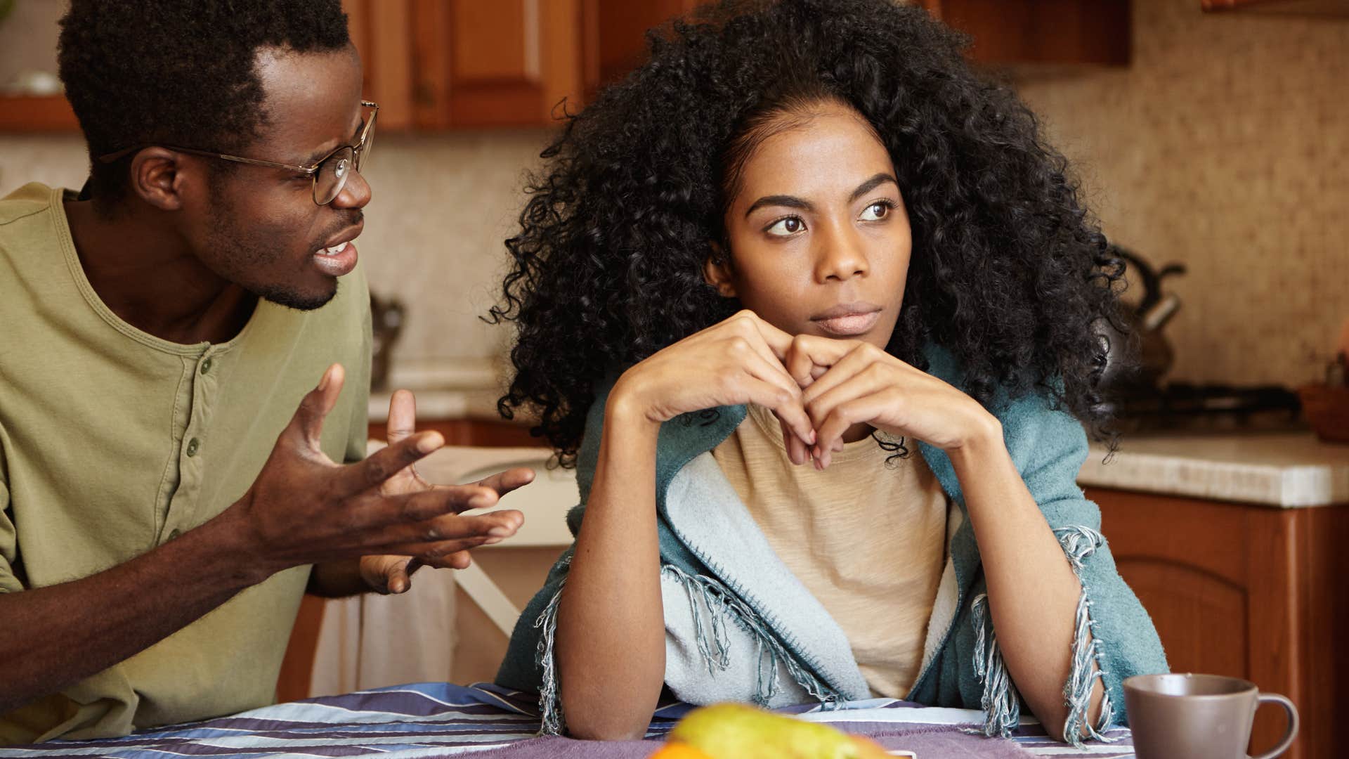 man having an intense conversation with woman to fix relationship