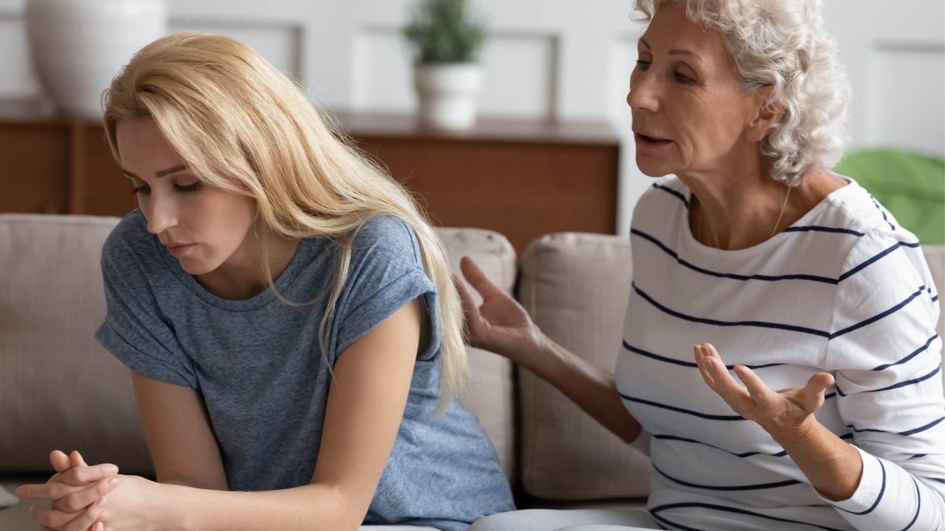 older woman over-explaining herself to younger woman