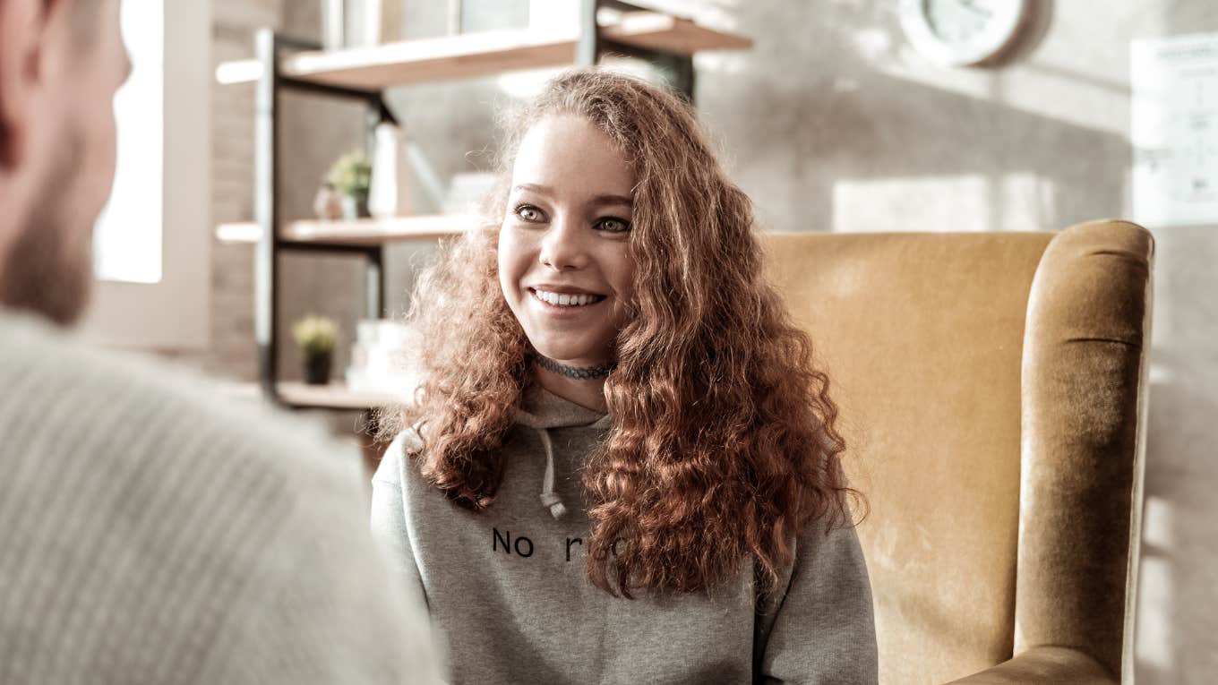 Young woman being strong and smart in an office setting with skills learned as a kid