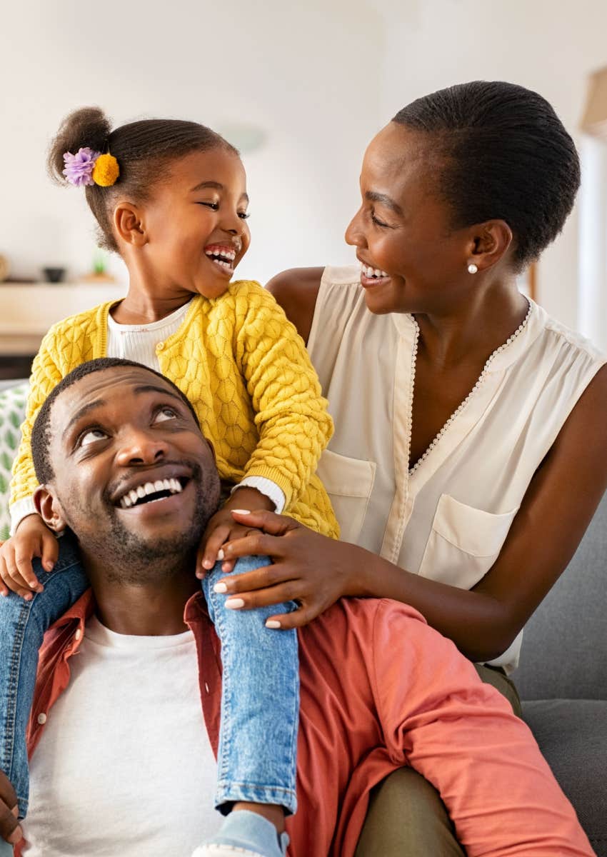 Happy family sitting together