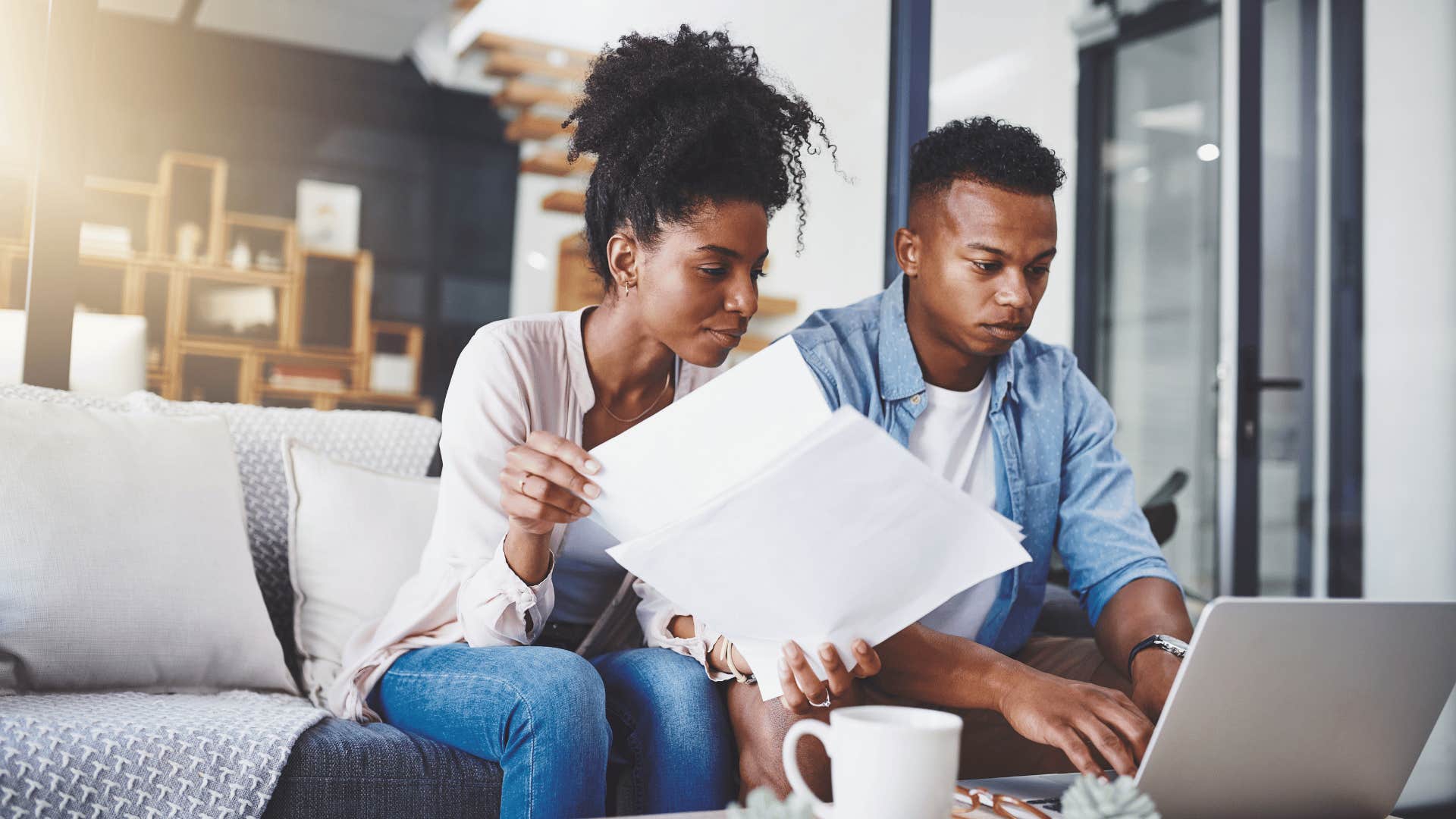 couple working on laptop