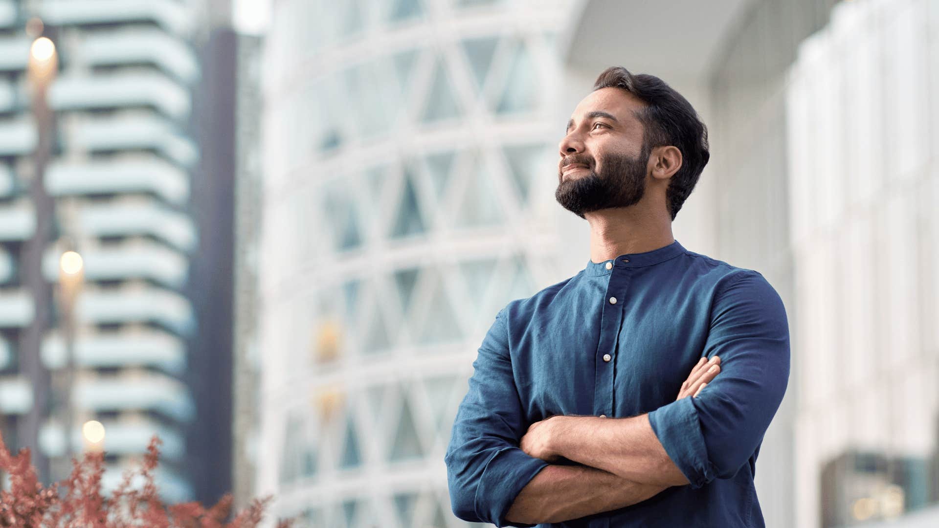 man smiling and looking up