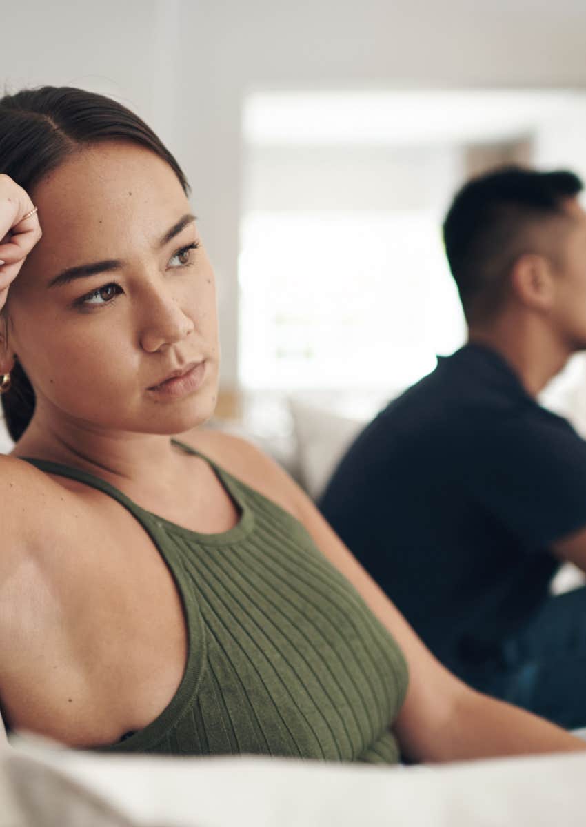 annoyed woman on couch