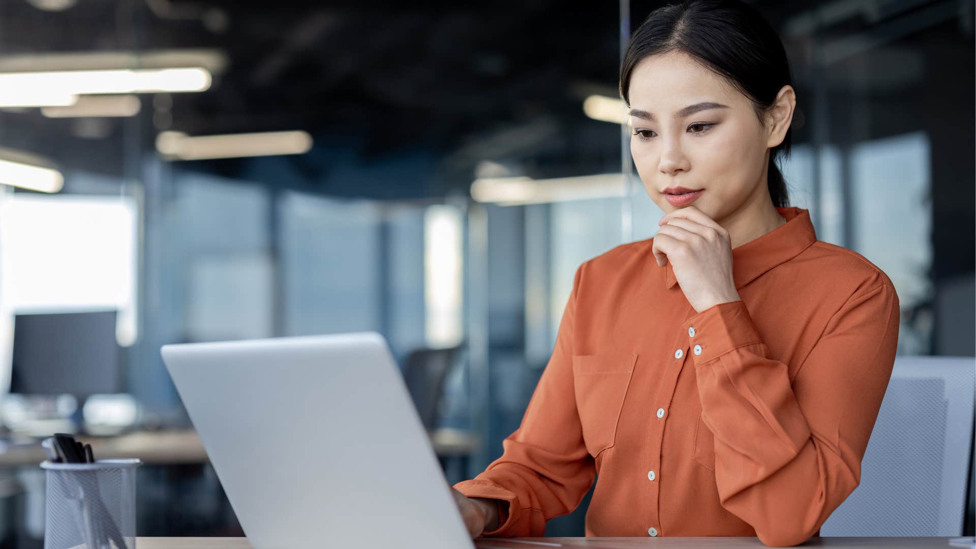 hard-working and ambitious woman in an office setting