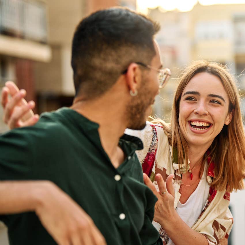 Decisivie woman talks to man