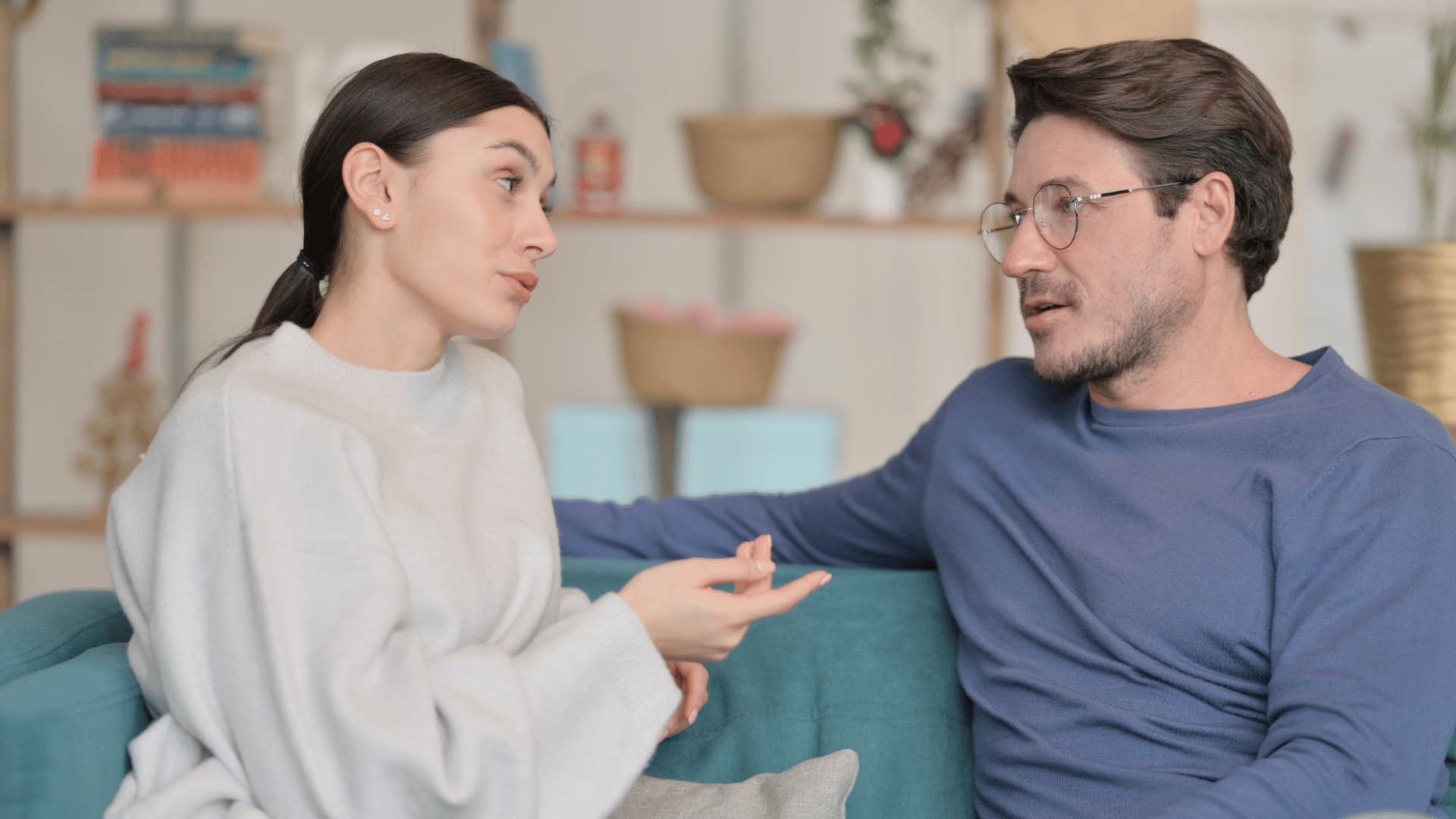 couple talking on couch