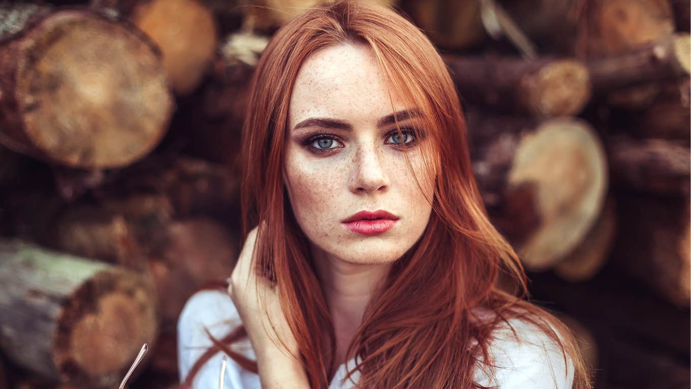 Red head woman looking serious 