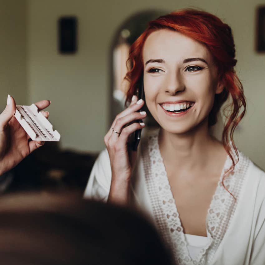 bride getting make up done 