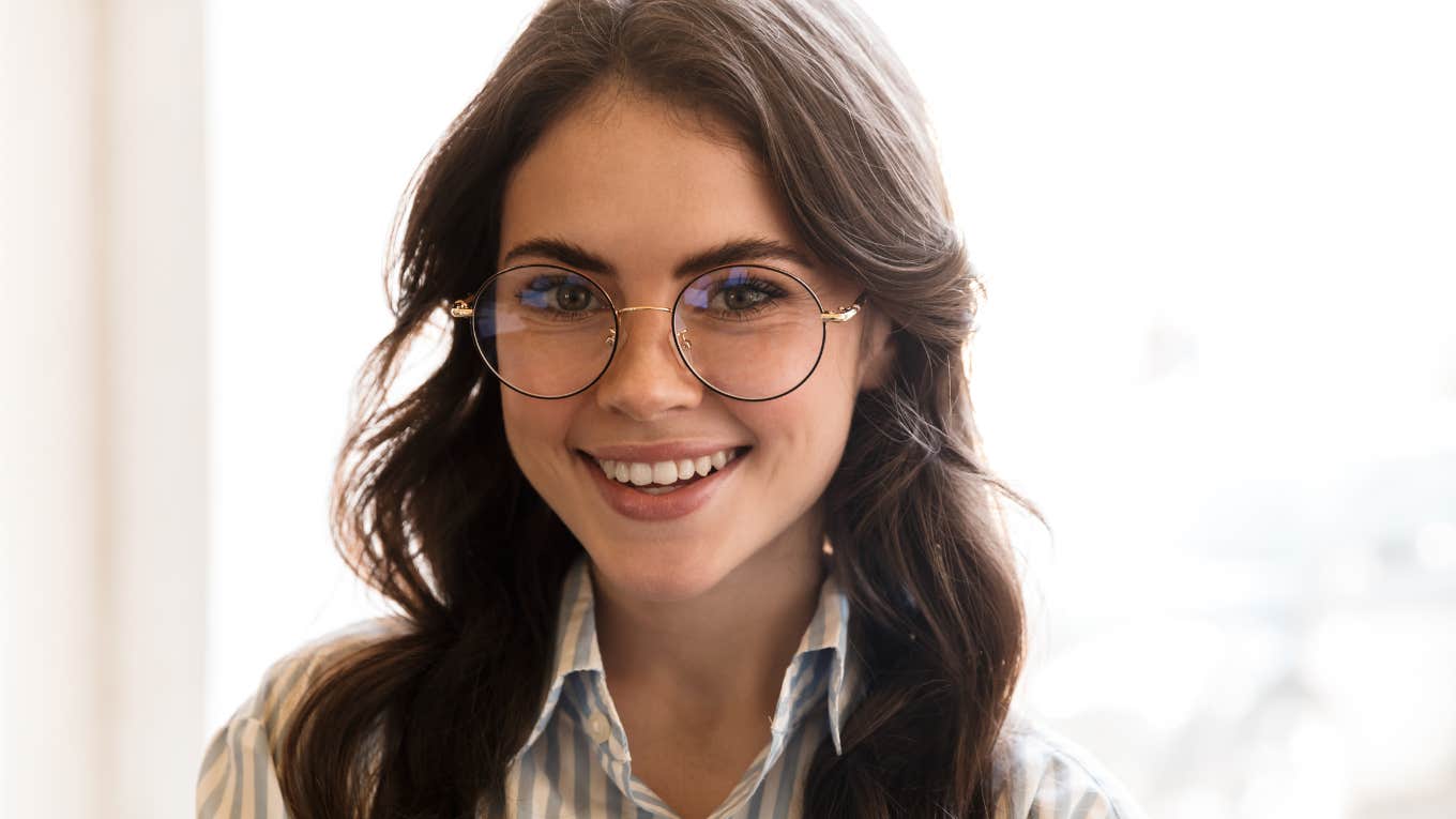 assertive woman wearing glasses