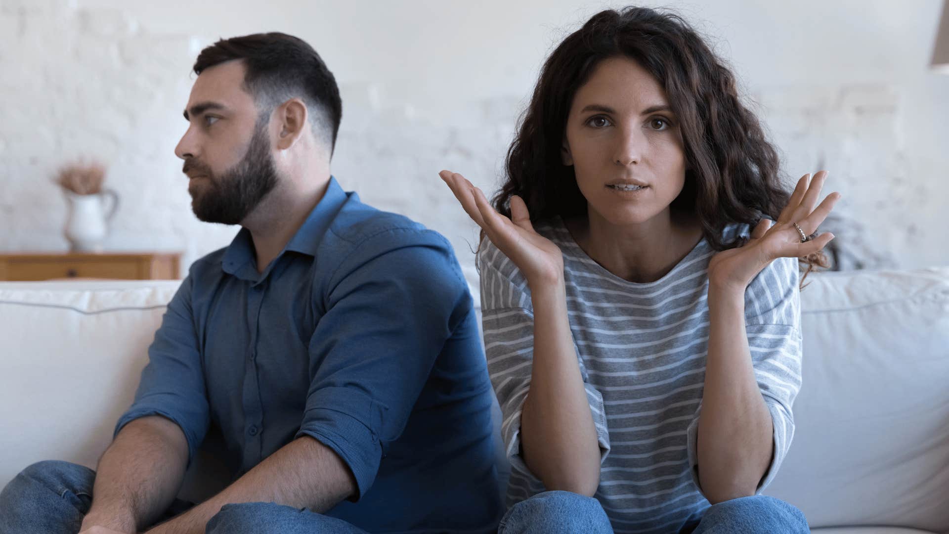 man and woman ignoring each other