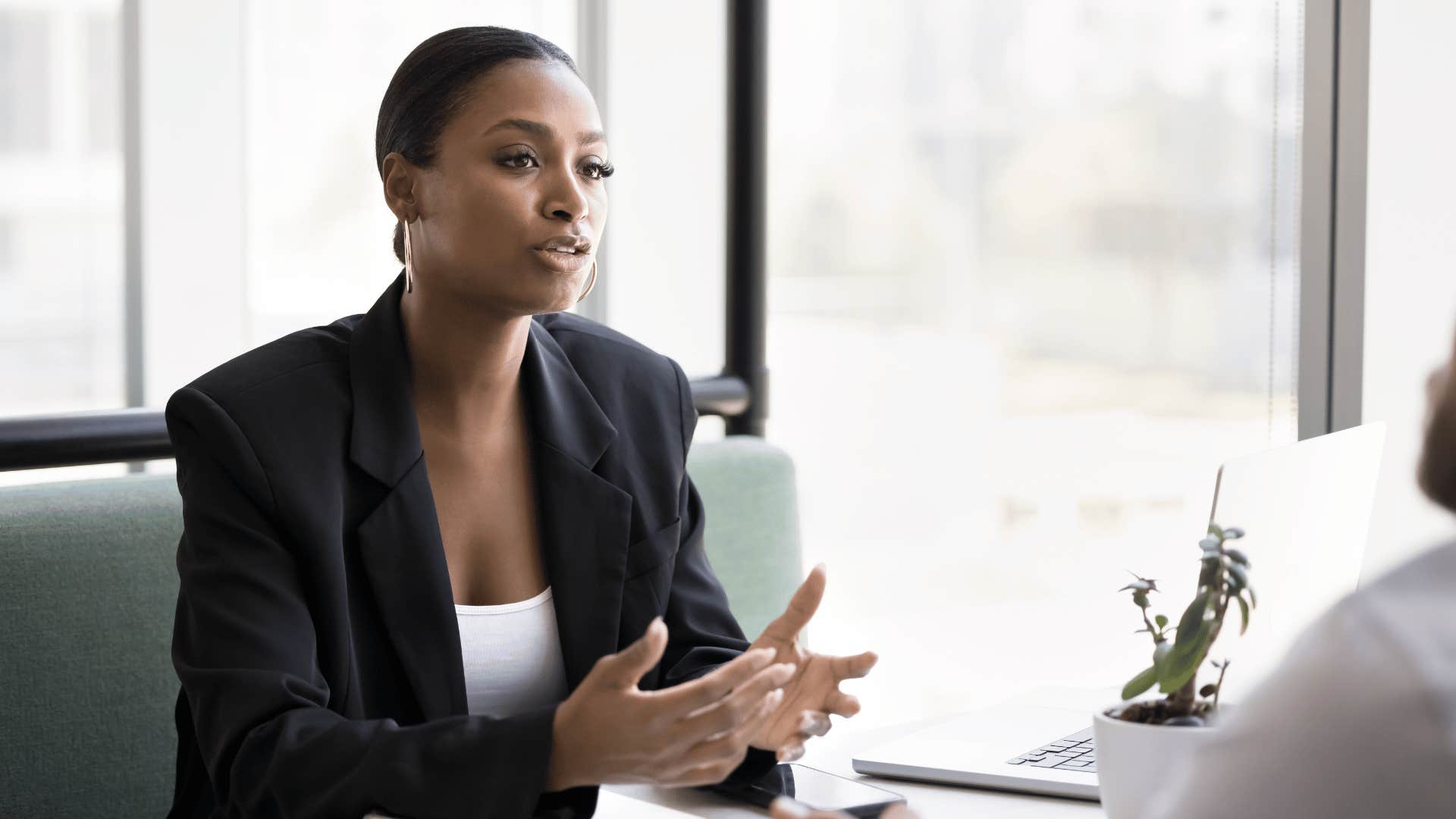 woman talking to coworker