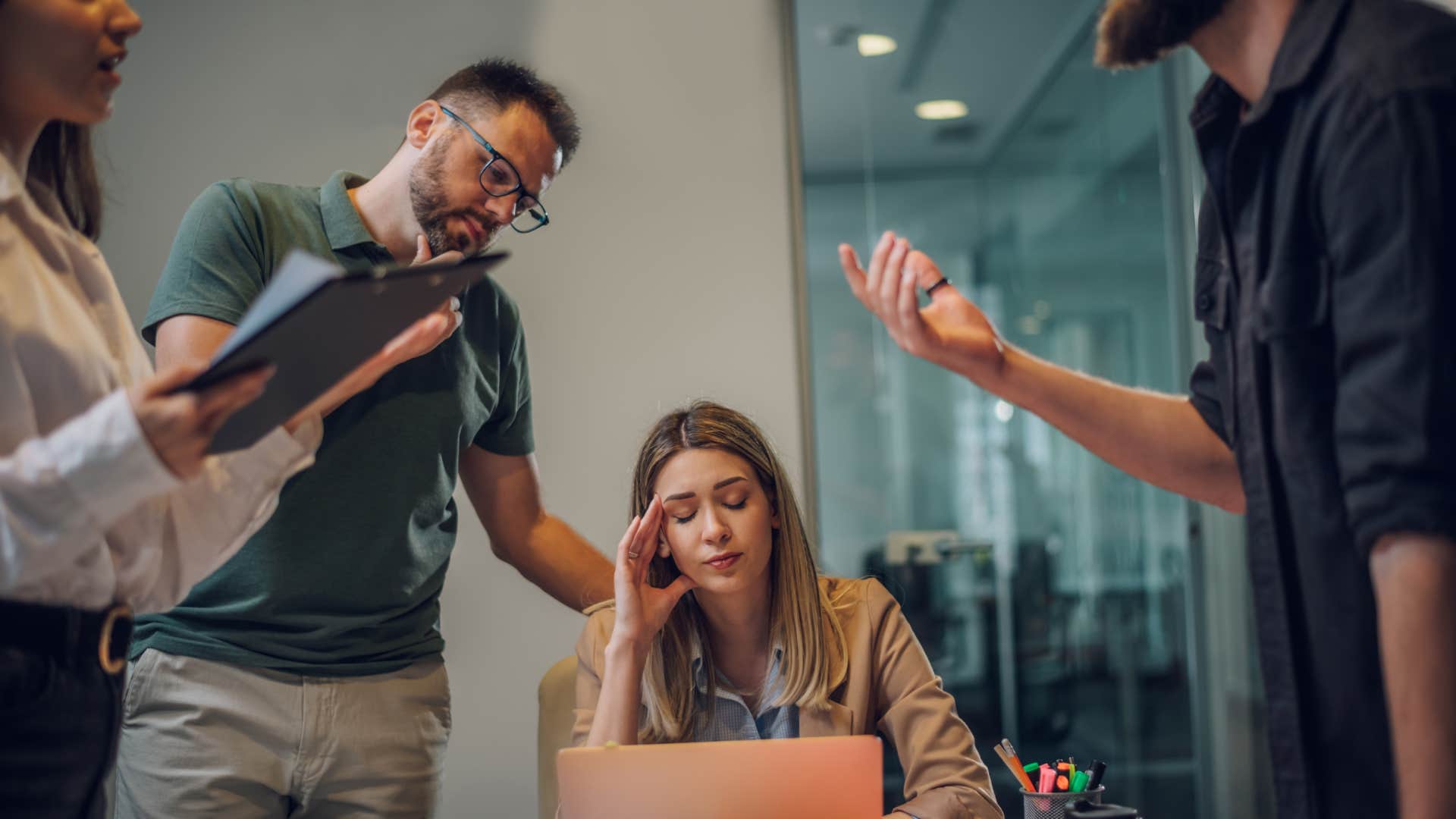 Stressed overwhelmed business colleagues feeling tired at corporate meeting.