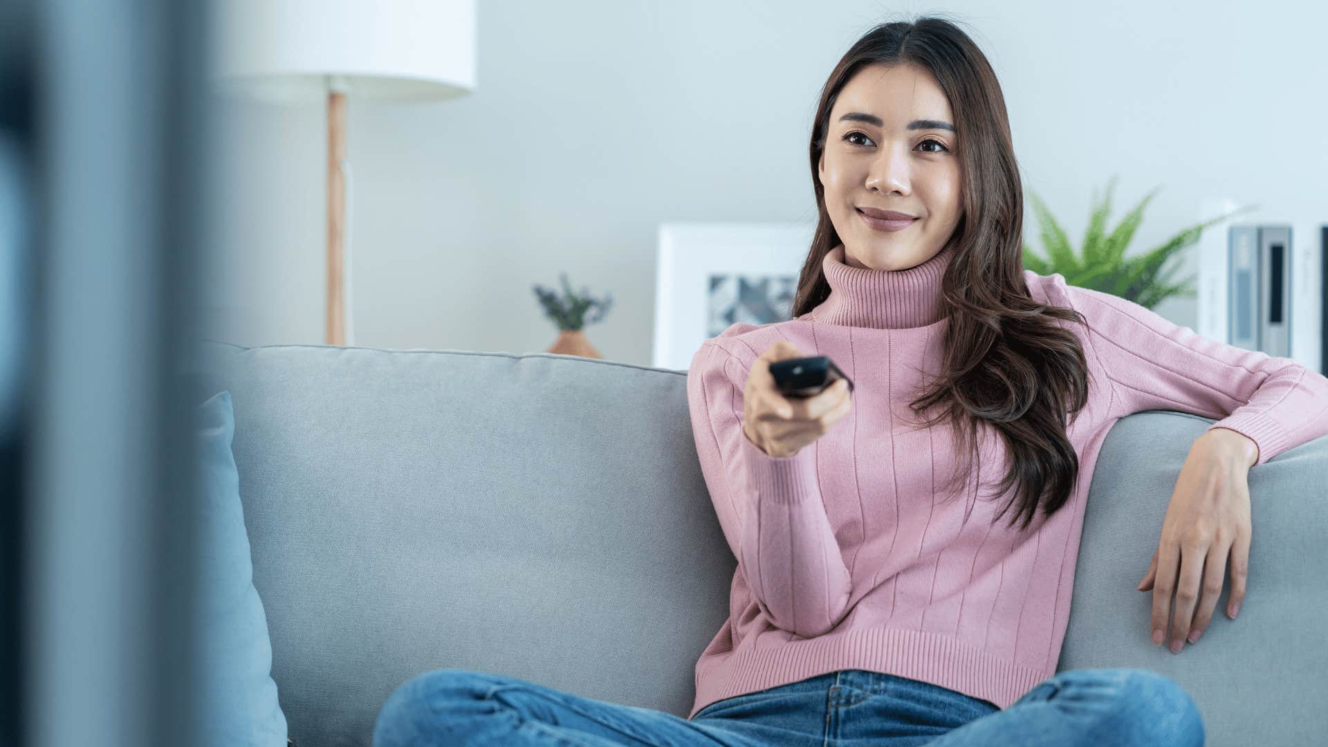 intelligent woman watching television