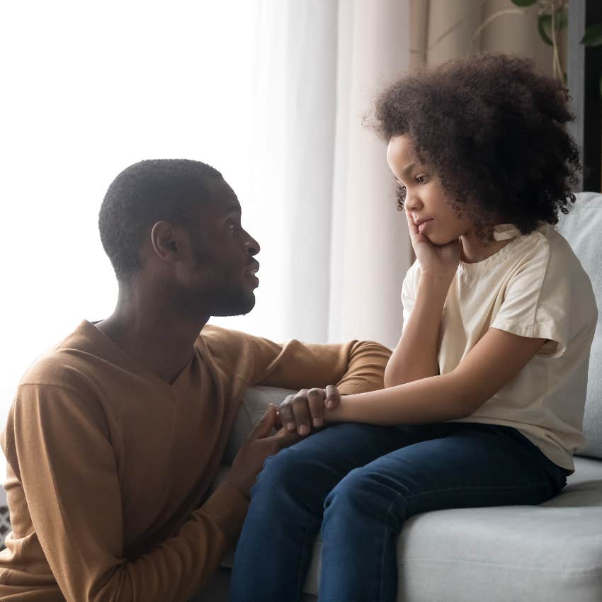 Dad comforting his daughter