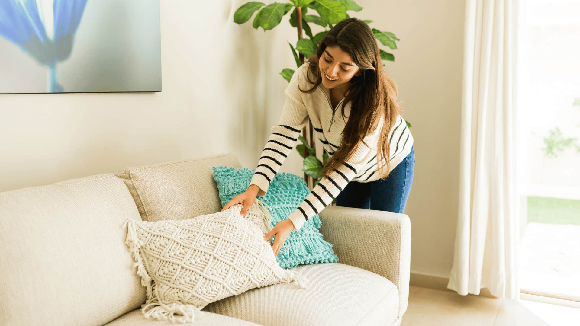 woman tidying up her home