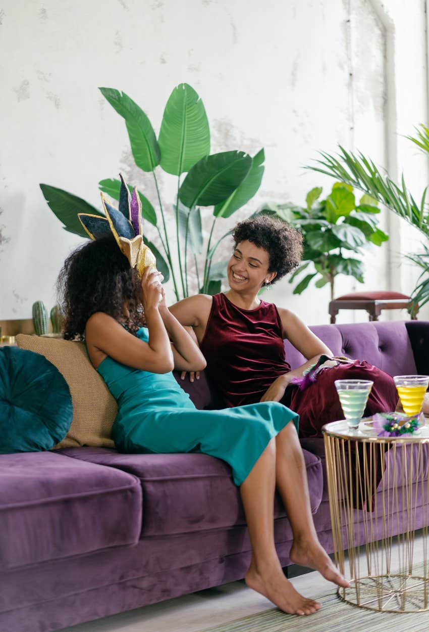 friends sitting on a couch at a party