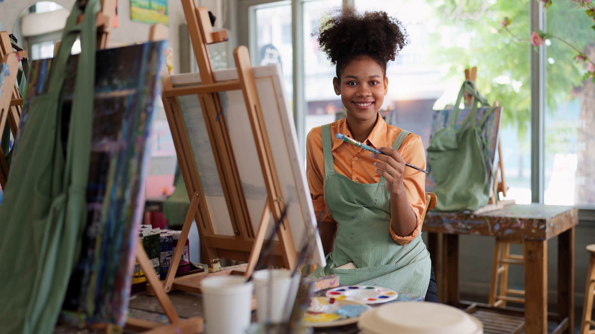 woman painting a picture