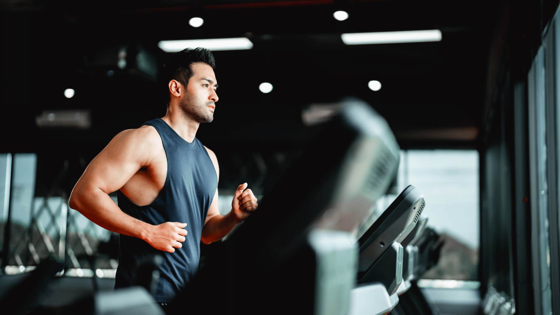 man running on treadmill