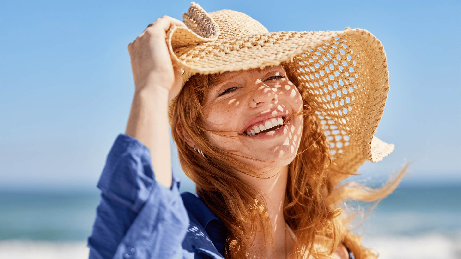 woman smiling on beach