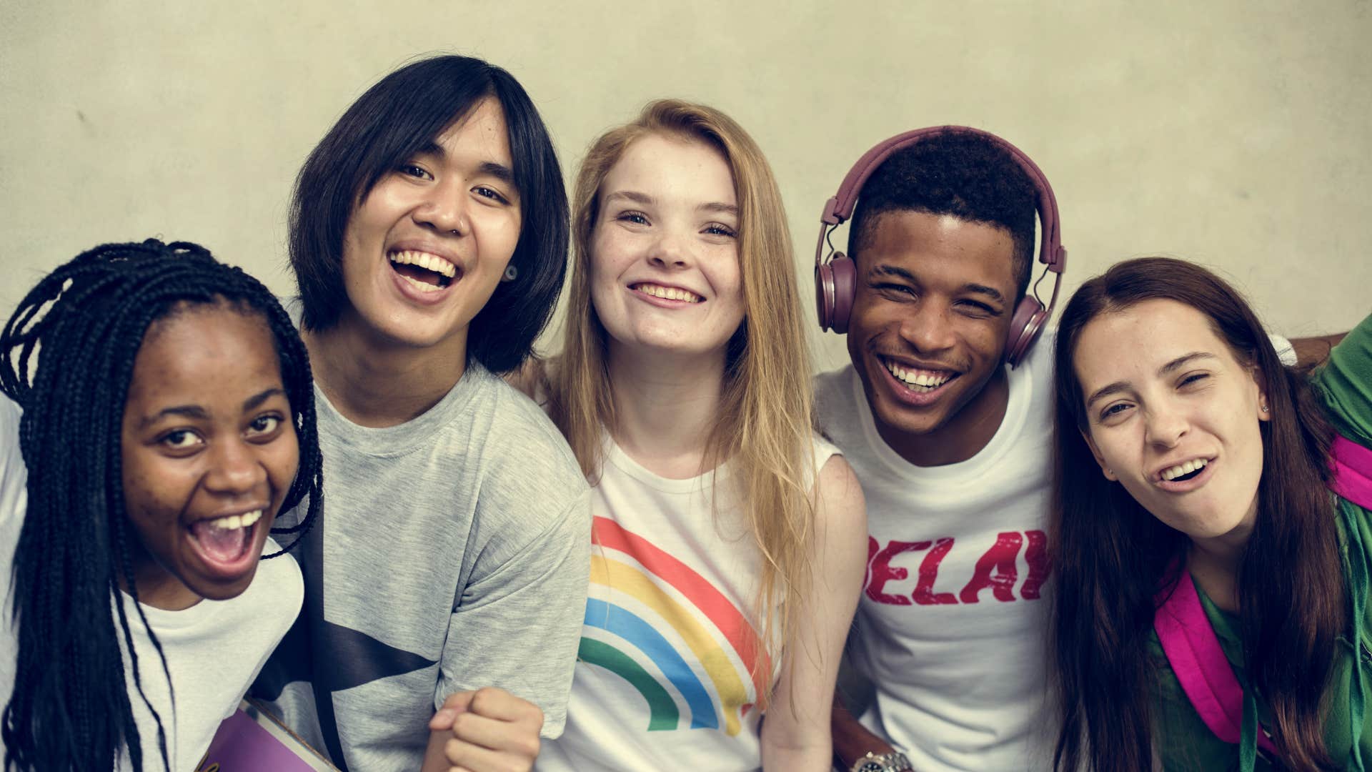 group of happy healthy teen friends