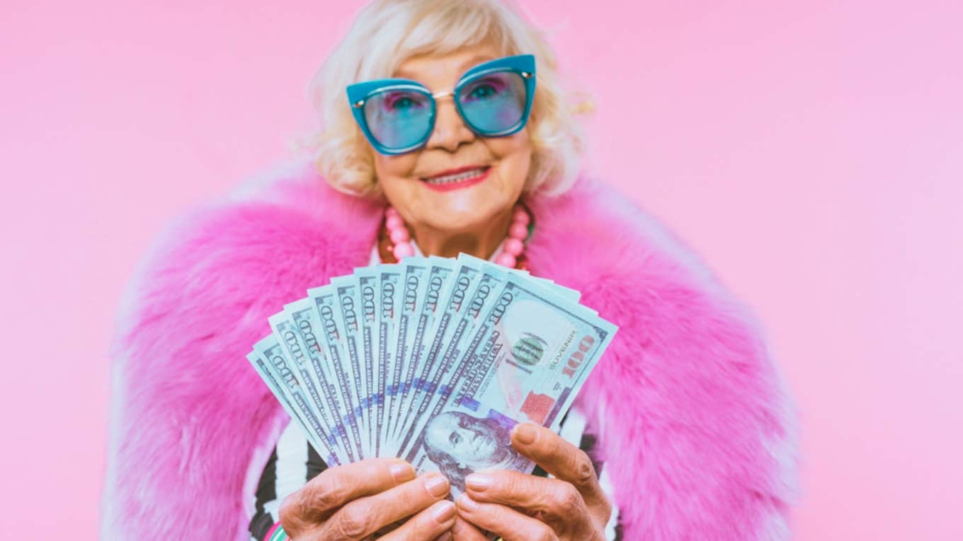 happy old lady with money