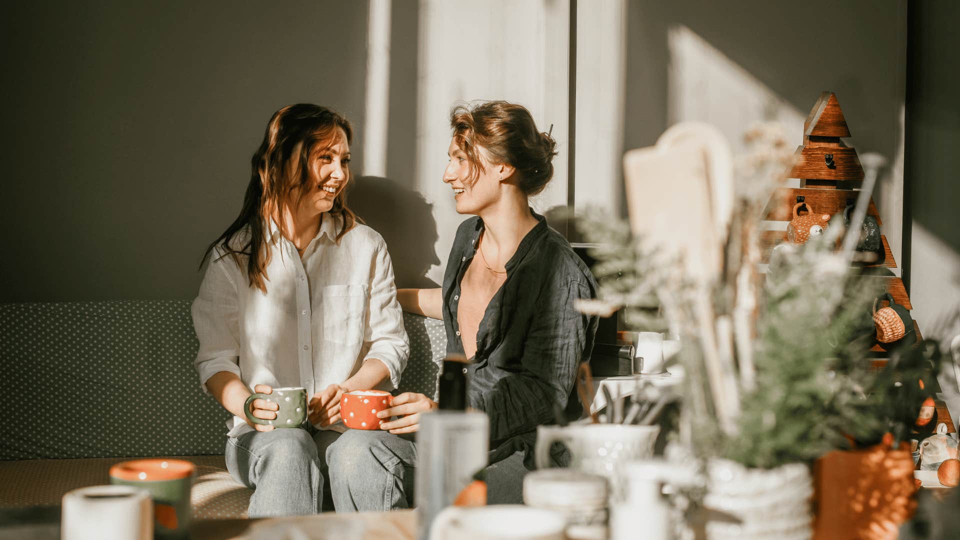 women drinking coffee and talking